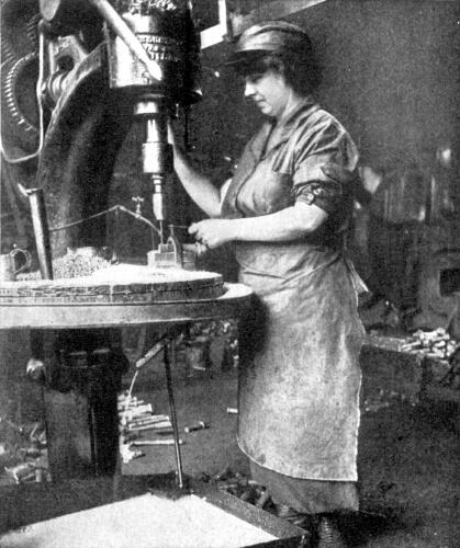 A girl employee working a drill in the Machine-Shops of the Baltimore and Ohio Railroad, Baltimore